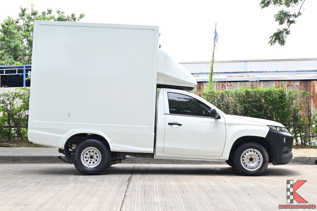 
								Mitsubishi Triton cargo 1534 full									